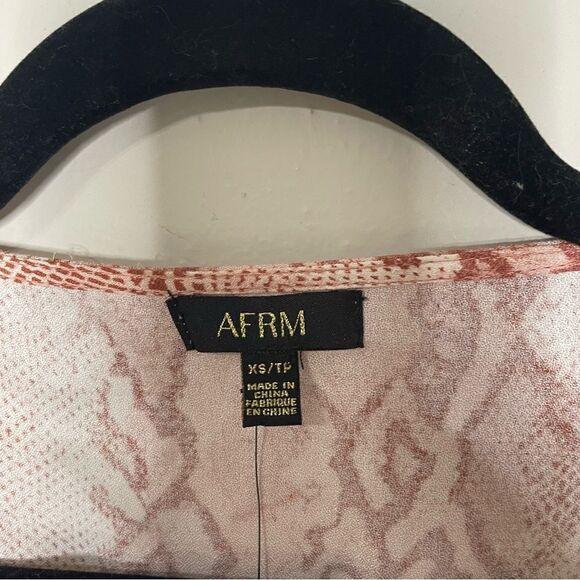 AFRM X Revolve The Olive Long Sleeve Smocked Crop Top In Soft Warm Snake Leopard - Picture 5 of 12